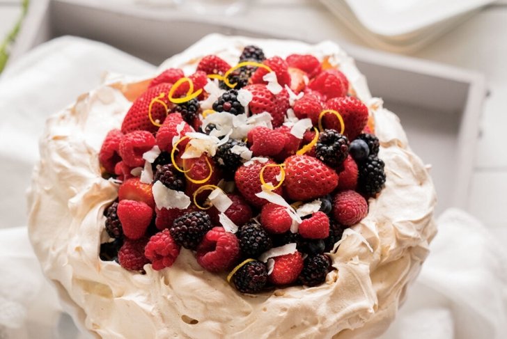 Pavlova with Berries and Lemon-Coconut Whipped Cream